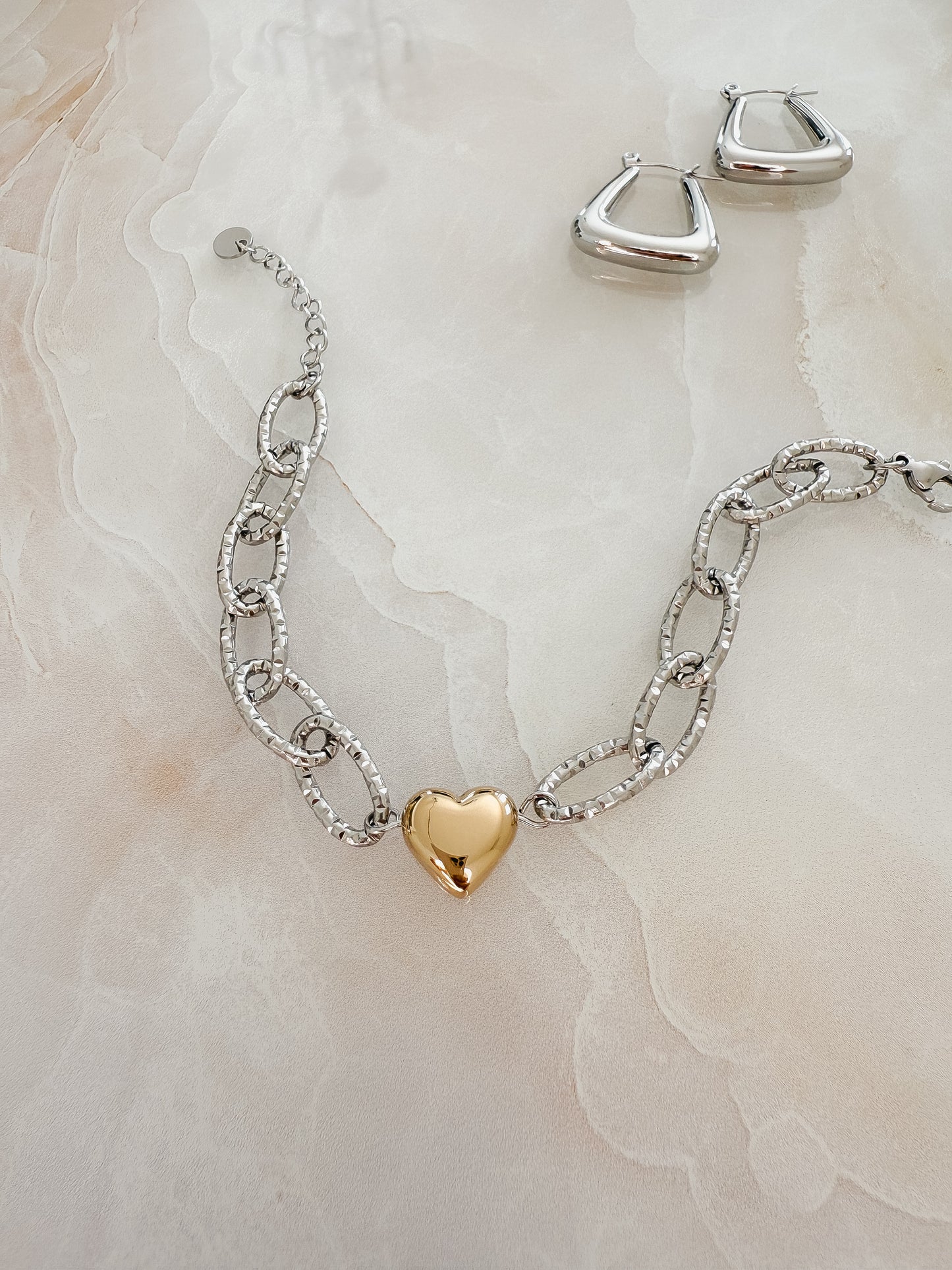 Pulsera dos tonos de eslabones con un corazón