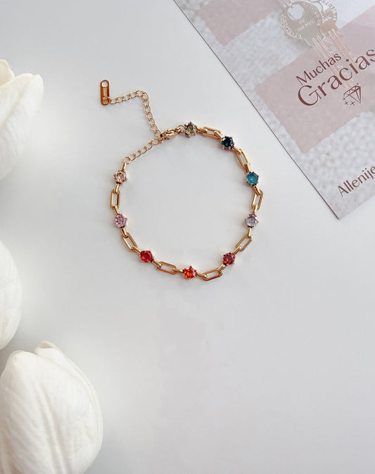 Pulsera de eslabones color oro y diamantes de colores