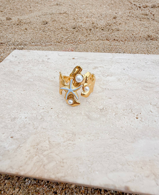 Estrella de mar y perlas