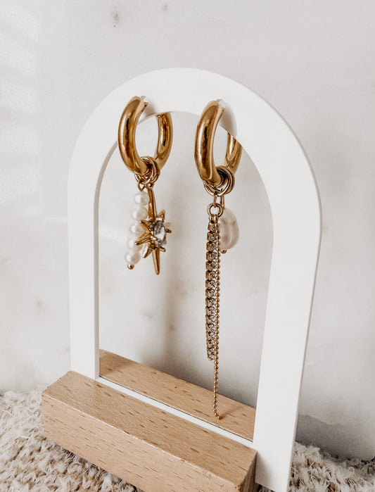 Hoops con charms de estrella y perlas